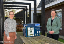 Evelien Smit wint koffiemachine bij actie van VSO makelaars & taxateurs